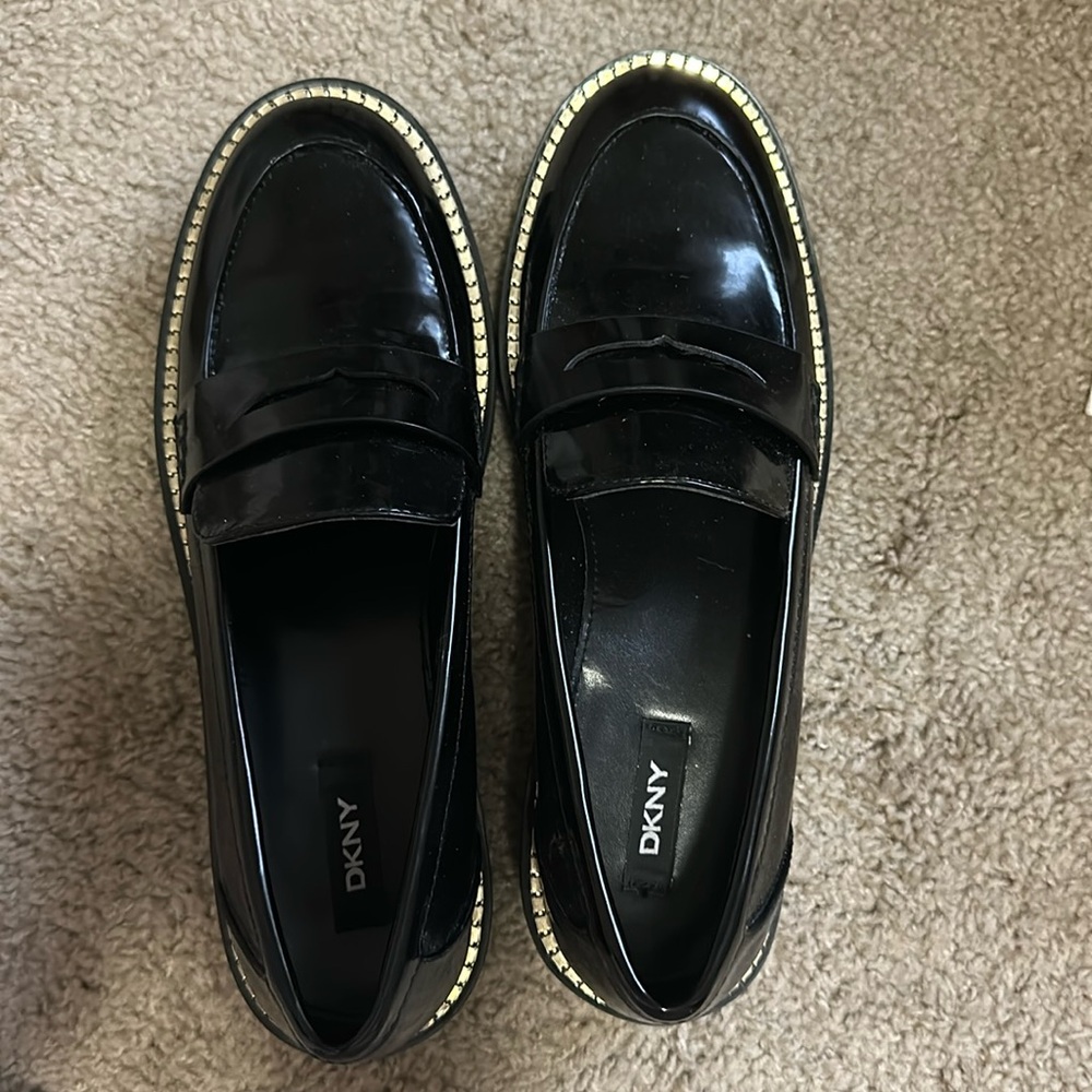 New without tags DKNY patent leather loafers with gold embellishments